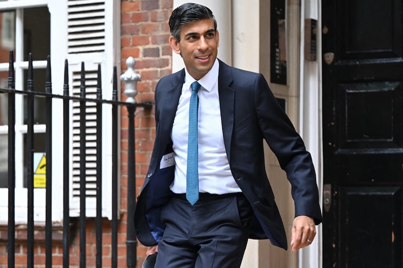 Rishi Sunak wearing a £3,500 Henry Herbert suit during his campaign to be prime minister. AFP