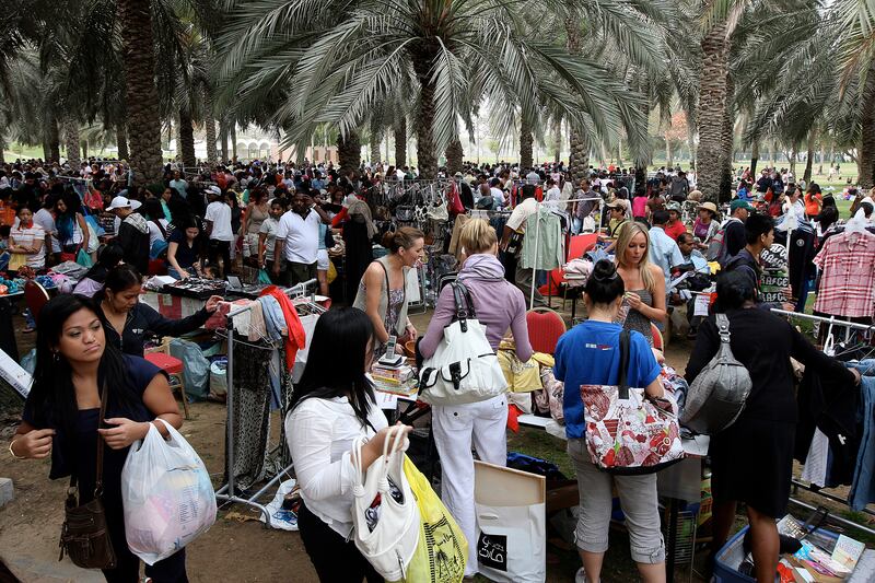 DUBAI, UNITED ARAB EMIRATES Ð Mar 5,2011: People buying different items in the flea market held at Safa park in Dubai. (Pawan Singh / The National) For News. 
