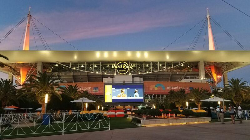 epa09142647 (FILE) - Exterior view of the Hard Rock Stadium at sunset during the Miami Open tennis tournament in Miami Gardens, Florida, USA, 26 March 2021 (re-issued on 18 April 2021). On 18 April 2021 Formula One organizers announced that the new Miami Grand Prix will join the F1 calendar in 2022. The race will be held on a new circuit at the Hard Rock Stadium complex in Miami Gardens.  EPA/RHONA WISE *** Local Caption *** 56790123
