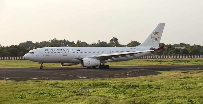 An Airbus A330 flight from Saudia with Indian Haj pilgrims on board prepares to depart from Sadar Vallabhbhai Patel International Airport in Ahmedabad on August 13, 2017, as they undertake the Haj Pilgrimage to Mecca in Saudi Arabia. 
 / AFP PHOTO / SAM PANTHAKY