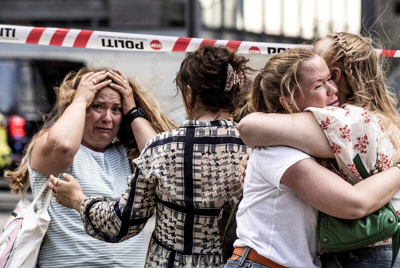 Tears of anguish in front of Field's shopping centre in Copenhagen after a shooting at the mall. Reuters
