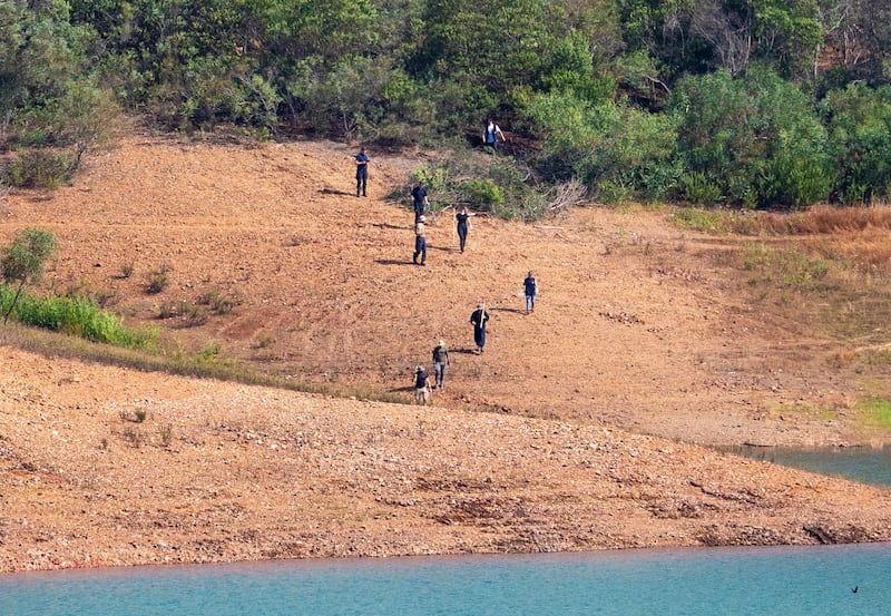 Portuguese and German police search a reservoir in the Algarve, near where British girl Madeleine McCann went missing in 2007. Reuters