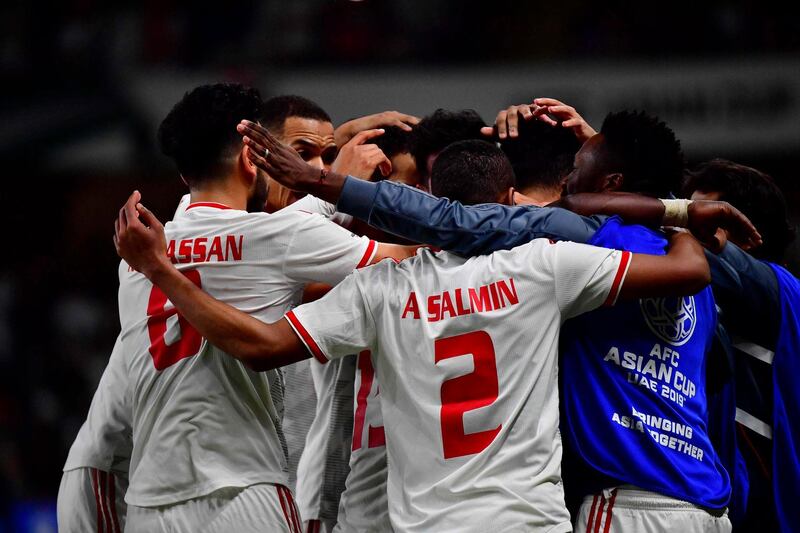 UAE's players celebrate their opening goal during the 2019 AFC Asian Cup quarter-final football match between UAE and Australia at Hazza bin Zayed Stadium in Al Ain. AFP