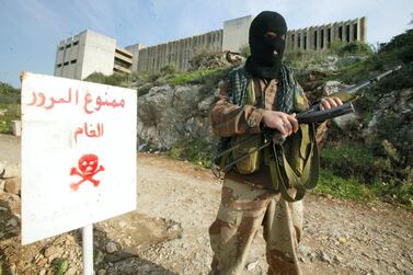 A PFLP-GC militant guards a base in Naameh, near Beirut in 2005. AFP / File Photo
