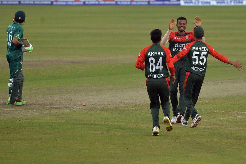Bangladesh's players celebrates after the dismissal of Mohammed Rizwan. AFP
