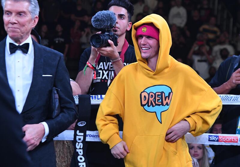 Justin Bieber waits in the ring after the fight between KSI and Logan Paul. AFP