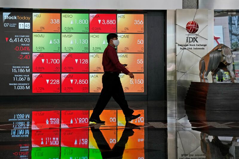 An electronic board displaying stock prices at the Indonesia Stock Exchange, in Jakarta. Indonesia's biggest tech group GoTo expects to list on the local bourse next year. AP