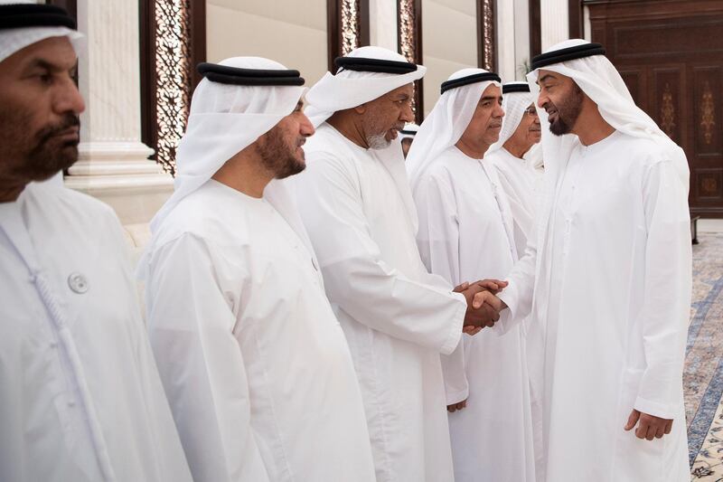 ABU DHABI, UNITED ARAB EMIRATES - June 05, 2018: HH Sheikh Mohamed bin Zayed Al Nahyan Crown Prince of Abu Dhabi Deputy Supreme Commander of the UAE Armed Forces (R), greets a retired member of the UAE Armed Forces during an iftar reception at Al Bateen Palace.

( Saeed Al Neyadi / Crown Prince Court - Abu Dhabi )
---