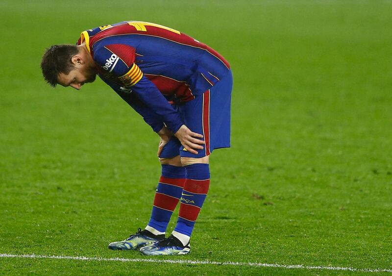 Barcelona's Lionel Messi looks dejected. Reuters