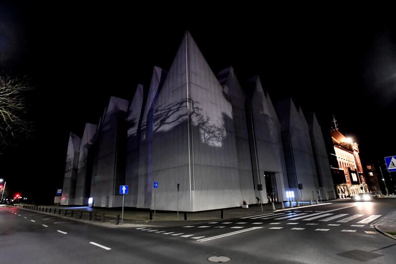 Poland: The illumination of the Philharmonic M Karlowicz symbolically dimming down, in Szczecin. EPA