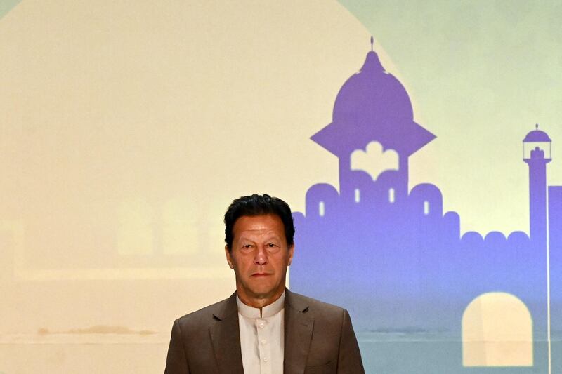 Pakistan's Prime Minister Imran Khan looks on during a Trade and Investments conference in Colombo on February 24, 2021 on the second day of Khan's official visit to Sri Lanka. (Photo by Ishara S. KODIKARA / AFP)