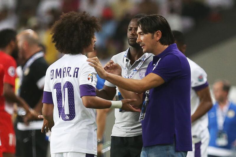 Al Ain coach Zlatko Dalic gives sideline tips to his player, Omar Abdulrahman during their game against Al Jazira n Al Ain on Tuesday night, May 13, 2014.     DELORES JOHNSON / The National