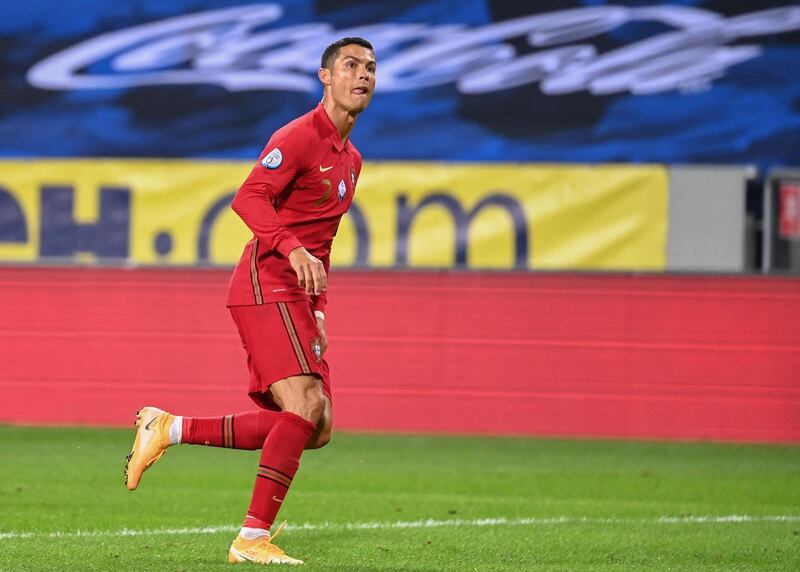 Cristiano Ronaldo watches the ball end up in the back of the net. AFP