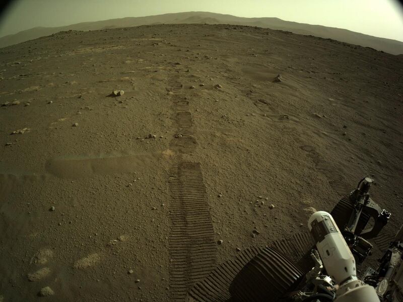 epa09055937 A handout photo made available by NASA shows tyre marks left by NASA's Perseverance Mars rover, 06 March 2021. The rover moved for the first time since landing on Mars on February, 18. Perseverance's main mission on Mars is astrobiology and the search for signs of ancient microbial life, according to NASA.  EPA/NASA/JPL-Caltech HANDOUT  HANDOUT EDITORIAL USE ONLY/NO SALES