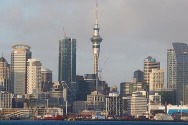The Sky Tower, centre, and other buildings stand in Auckland, New Zealand. The country's economy contracted the most since the Great Depression. Bloomberg