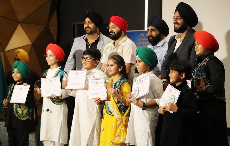 Children received certificates and awards during the anniversary event.
