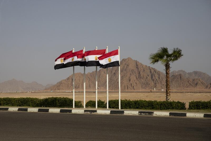 Egyptian flags fly in Sharm El Sheikh.  Getty