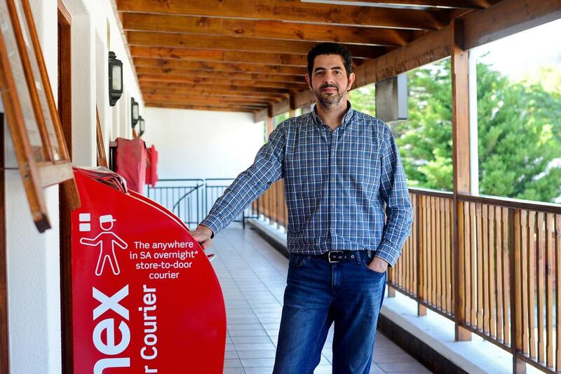 Abdallah El Khoury runs his import-export business using his Aramex box – and along the way he has become a gateway to trade with the world for the residents of his town. Lisa Leslie for The National