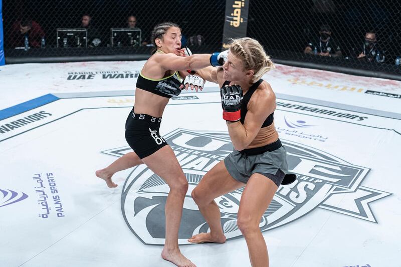 Gabriela Campo lands a punch on Manon Fiorot. Courtesy Palms Sports