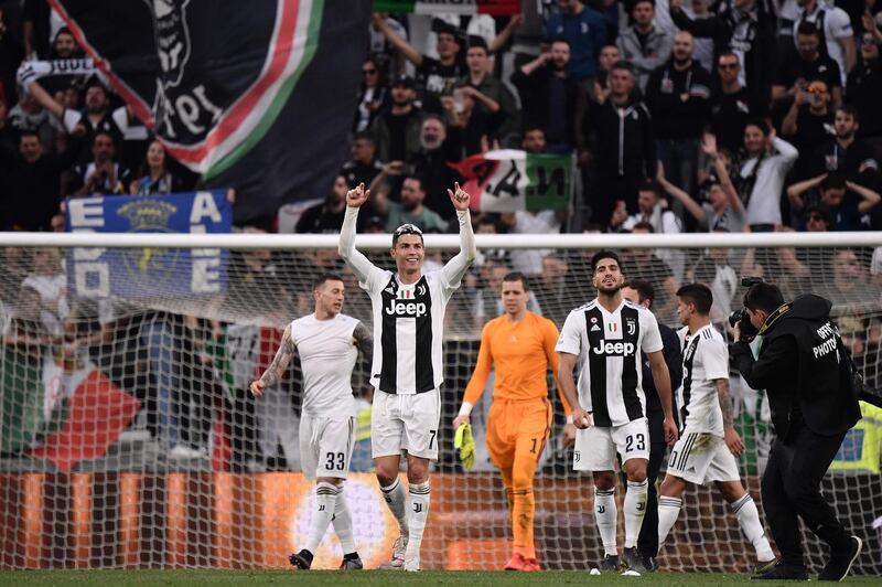 Cristiano Ronaldo acknowledges fans as Juventus celebrate winning the Serie A title. AFP