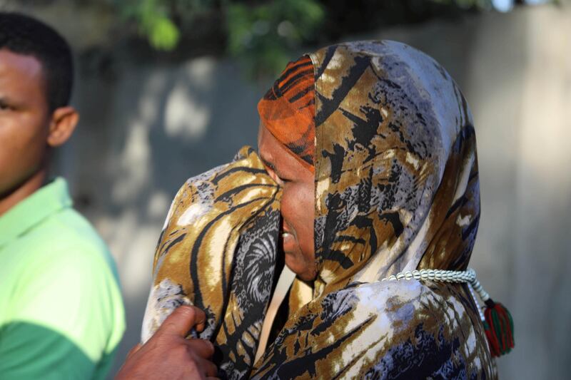 A Somali woman mourns at the scene of a suicide car bomb explosion, at the gate of Naso Hablod Two Hotel in Hamarweyne district of Mogadishu, Somalia October 29, 2017. REUTERS/Feisal Omar