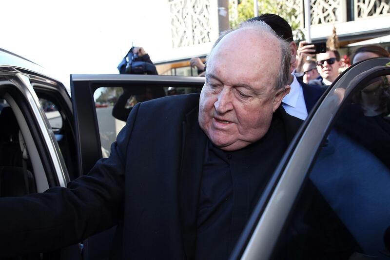 Former Australian archbishop Philip Wilson leaves a court in Newcastle on August 14, 2018. - Wilson, a former Australian archbishop convicted of concealing abuse by a notorious paedophile priest in the 1970s, was spared jail on August 14, with a court ruling he can serve his sentence in home detention. (Photo by Peter LORIMER / AFP)