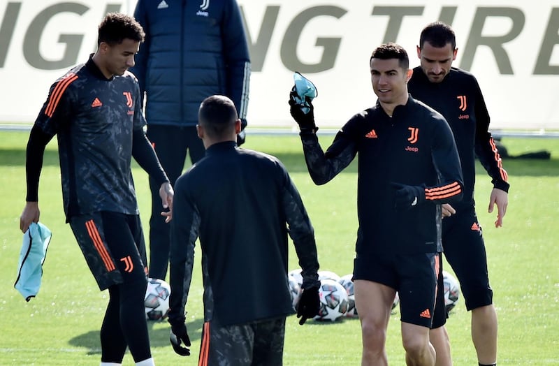 Cristiano Ronaldo training with teammates. Reuters