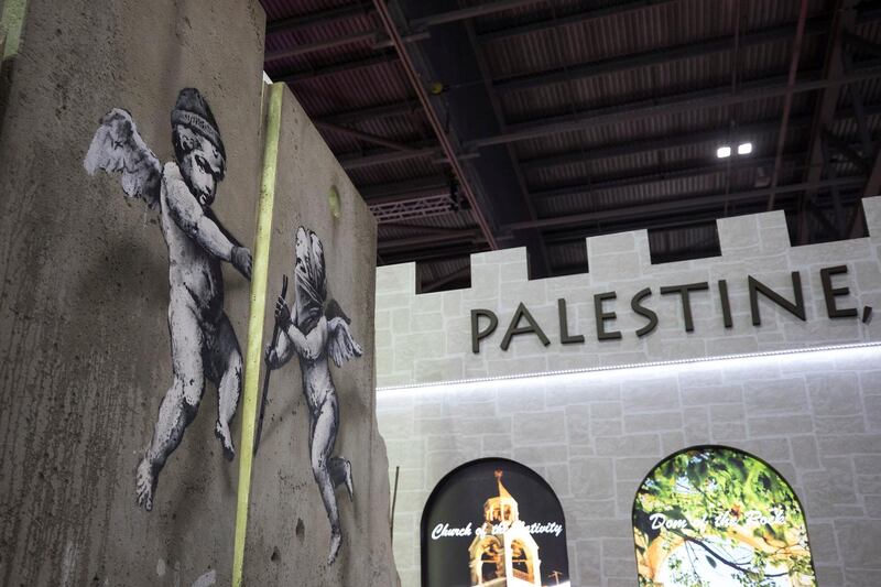 The 'replica separation barrier' created by British street artist Banksy stands. Reuters