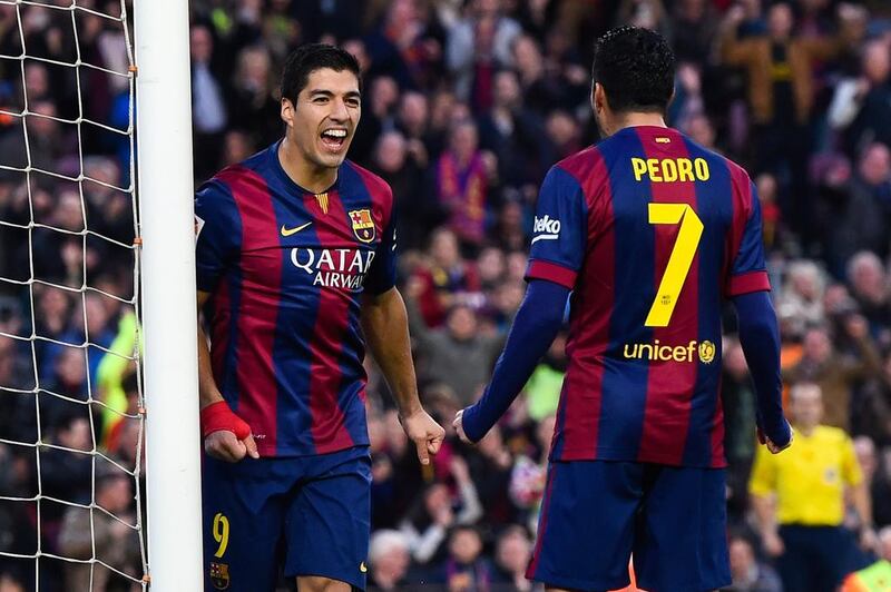 Barcelona's win excites  Luis Suarez, left, more than his goal did. David Ramos / Getty Images