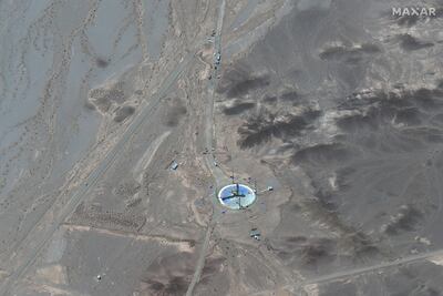 A satellite image shows activity at a launching pad at the Imam Khomeini Space Centre near Semnan, Iran, on Tuesday. Maxar Technologies / Reuters