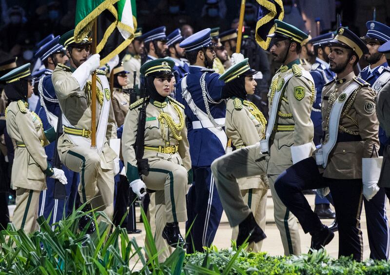 The graduates take part in a parade.