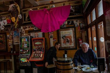 A customer has lunch in a restaurant in Madrid, Spain, Saturday, April 27, 2019. An uncertain outcome and the likelihood of the far-right entering Spain's Parliament looms over national elections on Sunday. AP