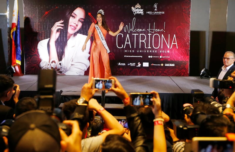 Catriona Gray tells the crowd she was "driven" to win the crown and now has a "responsibility" as a reigning beauty queen. AP