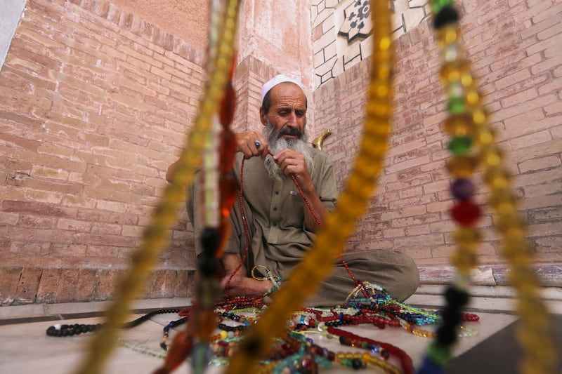 A Pakistani Muslim uses the prayer beads during the first Friday prayer of the Islamic holy month of Ramadan, in a mosque in Peshawar, Pakistan. Muslims around the world are celebrating the holy month of Ramadan by praying during the night time and abstaining from eating, drinking, and sexual acts daily between sunrise and sunset. Ramadan is the ninth month in the Islamic calendar and it is believed that the Koran's first verse was revealed during its last 10 nights.  EPA