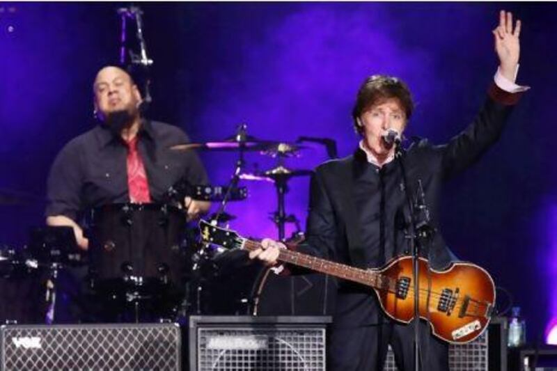 Sir Paul McCartney plays to a packed house at the Yas Arena last night. Antonie Robertson / The National