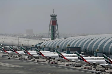 Dubai International Airport is the world's busiest by international passengers. The UAE will halt all passenger flights starting on March 25. AP Photo