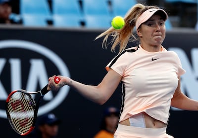 Ukraine's Elina Svitolina makes a forehand return to Serbia's Ivana Jorovic during their first round match at the Australian Open tennis championships in Melbourne, Australia, Monday, Jan. 15, 2018. (AP Photo/Ng Han Guan)