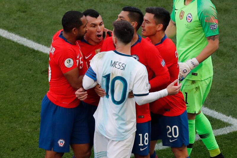 Messi, and Chile's Gary Medel, second from left, scuffle in the incident that led to red cards for the pair. AP Photo