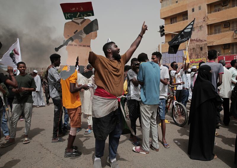 Sudanese protesters on June 3 commemorate the third anniversary of a deadly crackdown by security forces on protesters during a sit-in outside the army headquarters in Khartoum.  AP Photo