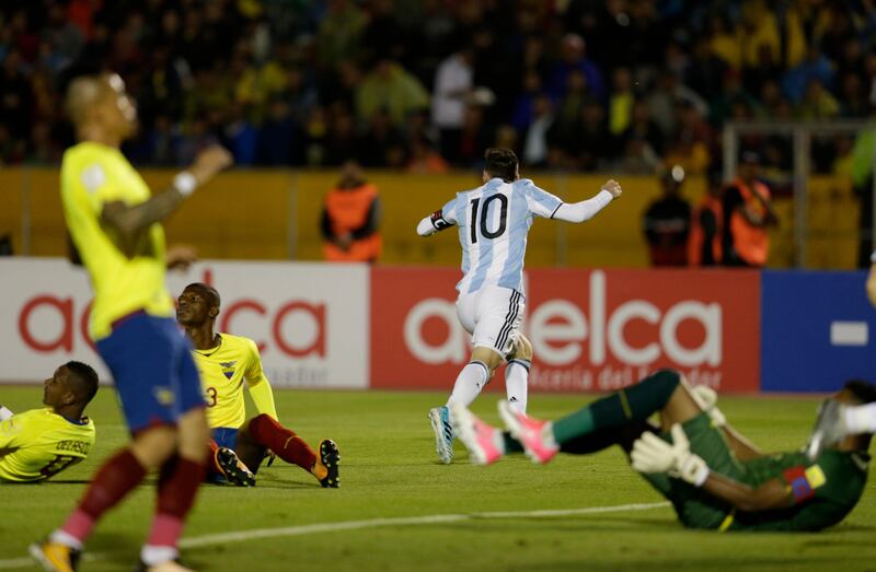 Lionel Messi runs as he celebrates after scoring against Ecuador. Dolores Ochoa / AP Photo