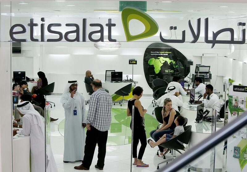 Etisalat’s preliminary 2016 financial statements indicates a payout ratio of 82 per cent. Satish Kumar / The National