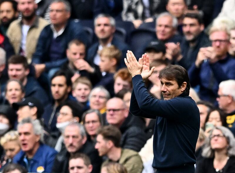 Tottenham Hotspur manager Antonio Conte applauds fans. Reuters