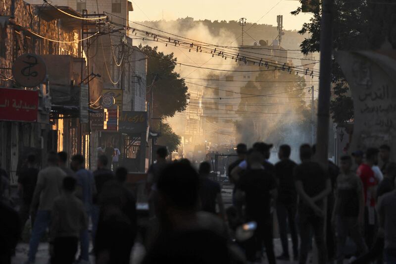 Palestinians clash with Israeli forces during a military operation in the Jenin refugee camp. AFP