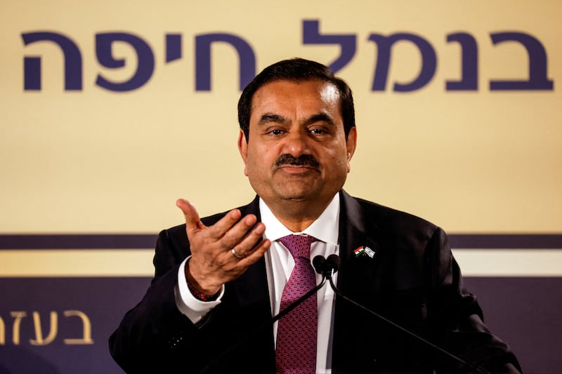 Indian billionaire Gautam Adani's current net worth is $52.4 billion, down sharply from a peak of $150 billion in September last year. Reuters