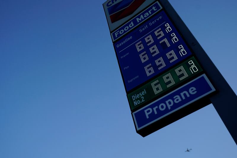 Petrol prices are advertised at almost $7 a gallon in Los Angeles, California. AP