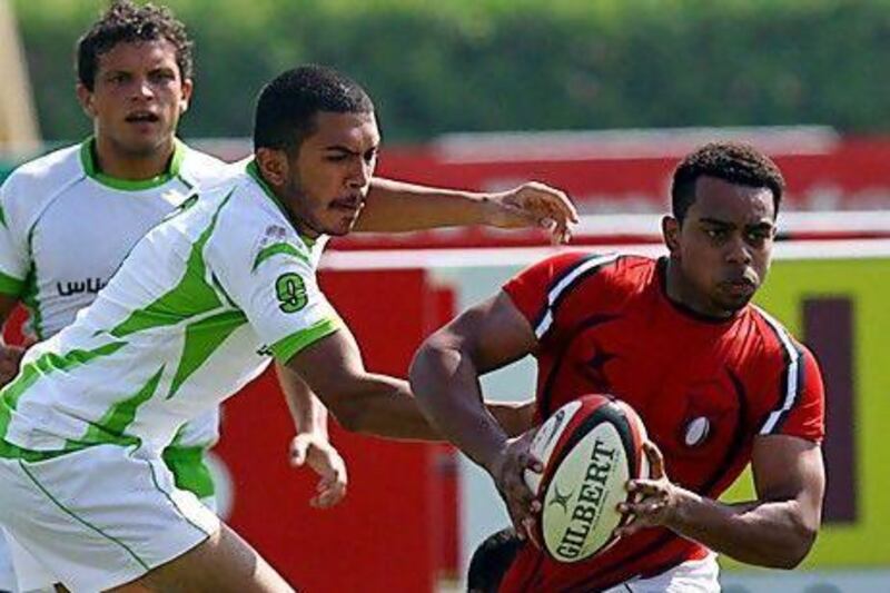 Majid Al Balooshi, right, is one of the few Emirati players to progress to the UAE national team. The National