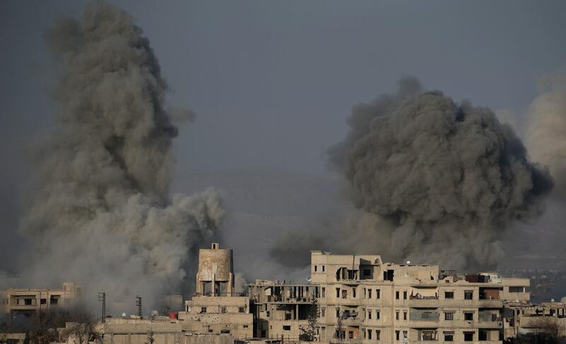 Smoke billows following Syrian government bombardments on the besieged rebel-held town of Hamouria in the eastern Ghouta region on the outskirts of the capital Damascus on March 3, 2018. Abdulmonam Eassa / AFP