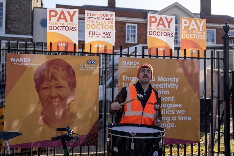 A striking junior doctor outside Maudsley Hospital in London. Getty