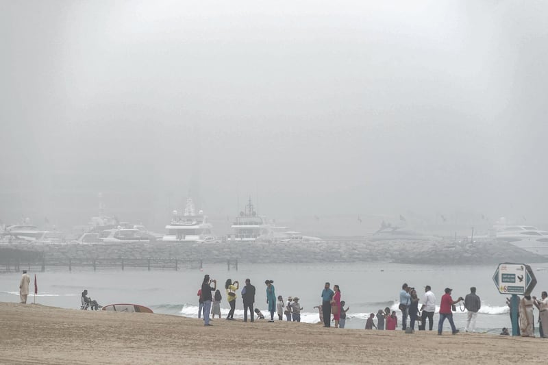 DUBAI, UNITED ARAB EMIRATES. 24 DECEMBER 2017. Heavy morning fog envelopes the city. Sunset beach next to the Burja Al Arab. (Photo: Antonie Robertson/The National) Journalist: None. Section: National.