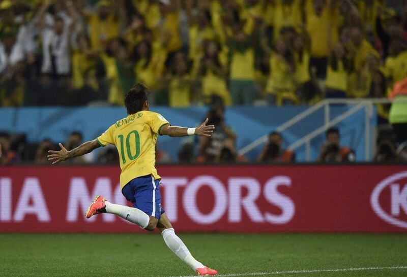 Neymar celebrates after scoring against Croatia in Brazil's World Cup opening victory on Thursday at the Arena Corinthians in Sao Paulo, Brazil. Dimitar Dilkoff / AFP / June 12, 2014
